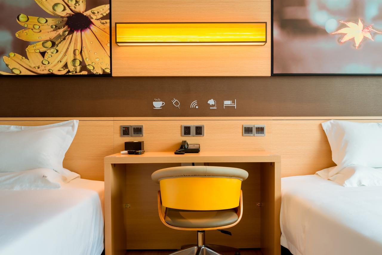 Iu Hotel Zhanjiang Haibin Avenue Xinhaimingchen Εξωτερικό φωτογραφία
